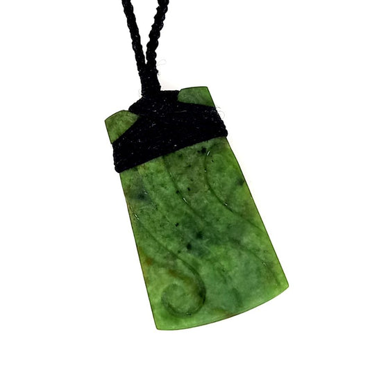 NZ Greenstone carving within a carving Pounamu